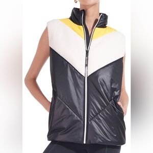 New Balance x Staud mixed media puffer vest